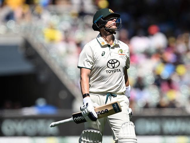 Australia's Steve Smith reacts in frustration after being dismissed by India's Jasprit Bumrah on the second day of the second Test cricket match between Australia and India at the Adelaide Oval in Adelaide on December 7, 2024. (Photo by Michael ERREY / AFP) / -- IMAGE RESTRICTED TO EDITORIAL USE - STRICTLY NO COMMERCIAL USE --