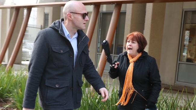 A Coroners Court inquest continues into the death of Snezana Stojanovska, who was found dead lying on a makeshift bench press in her garage in 2010. Snezana's husband Drag Stojanovski arrives at the court and is confronted by the victims aunty. Picture: Alex Coppel