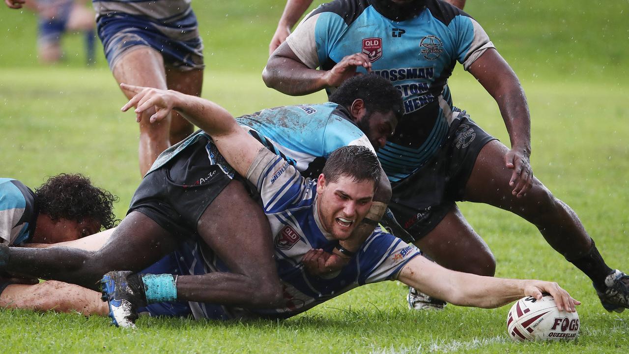 Brothers' Evan Child stretches out to score a try in the Cairns and District Rugby League (CDRL) match between the Cairns Brothers and the Mossman-Port Douglas Sharks, held at Stan Williams Park, Manunda. Picture: Brendan Radke