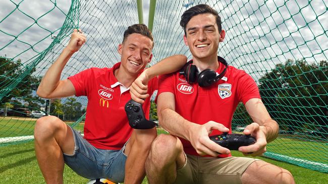 Adelaide United has selected Jamie O'Doherty (right) to represent it in the E-League. His brother Jordan O'Doherty plays for Adelaide United's A-League team. Picture: Tom Huntley