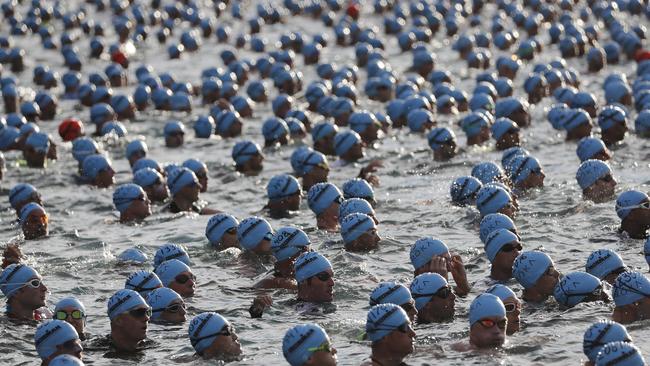 Swimmers waiting for the start of the Hawaii Ironman triathlon.