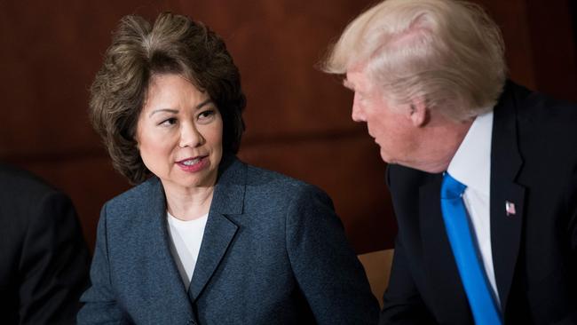 US Transportation Secretary Elaine Chao and Donald Trump participate in a roundtable discussion at the US Department of Transportation. Picture: AFP.