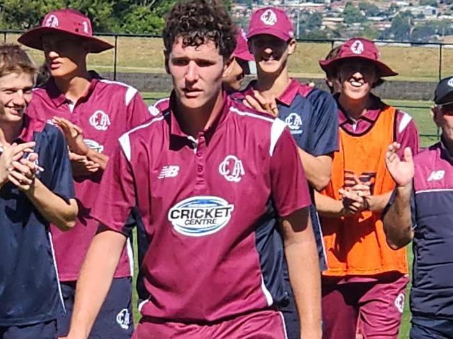 Blake Armstrong leaves the field after his 102 not out.