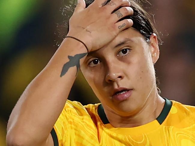 SYDNEY, AUSTRALIA - AUGUST 16: Sam Kerr of Australia reacts after England's second goal  during the FIFA Women's World Cup Australia & New Zealand 2023 Semi Final match between Australia and England at Stadium Australia on August 16, 2023 in Sydney, Australia. (Photo by Alex Pantling - FIFA/FIFA via Getty Images)