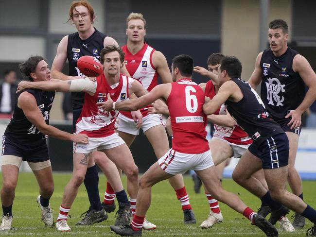 Sorrento’s Chad Harris leads the race for the ball. Picture: Valeriu Campan