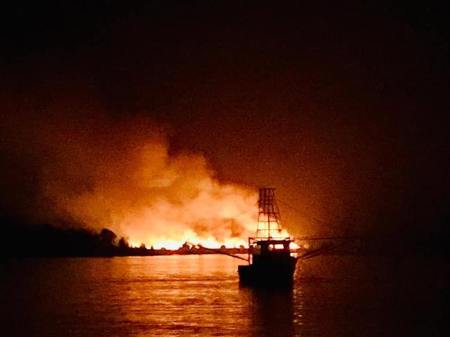 Congratulations to Paola Sisson for winning this week's Cover Image competition for their photo of a fishing trawler against a cane fire backdrop.