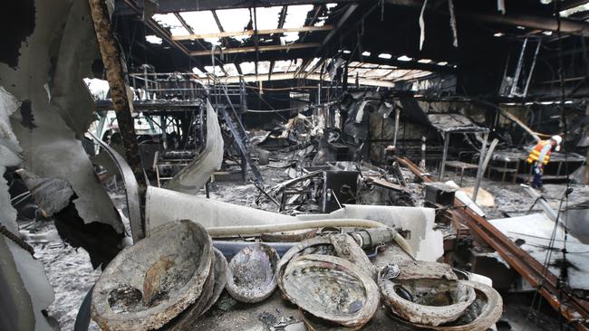 A business in Mallacoota lays in ruins after fire gutted the building. Picture: David Caird