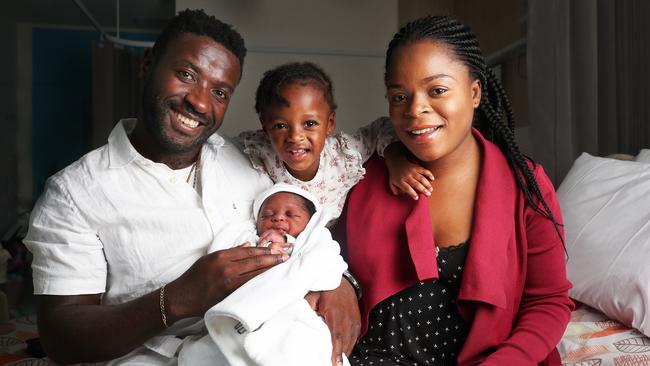 Baby Peterson with parents Peter and Esther Songa with big sister Petra 2. Baby Peterson was born on New Year's Day at the Royal Hobart Hospital. Picture: NIKKI DAVIS-JONES