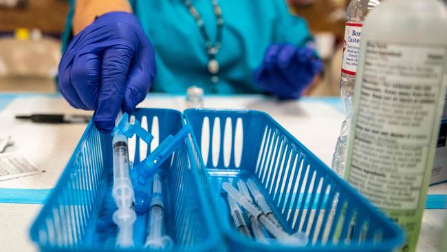 Some Queensland nurses fear for their health if they get a COVID-19 vaccine, but fear for their jobs if they do not. Picture: Sergio Flores/Getty