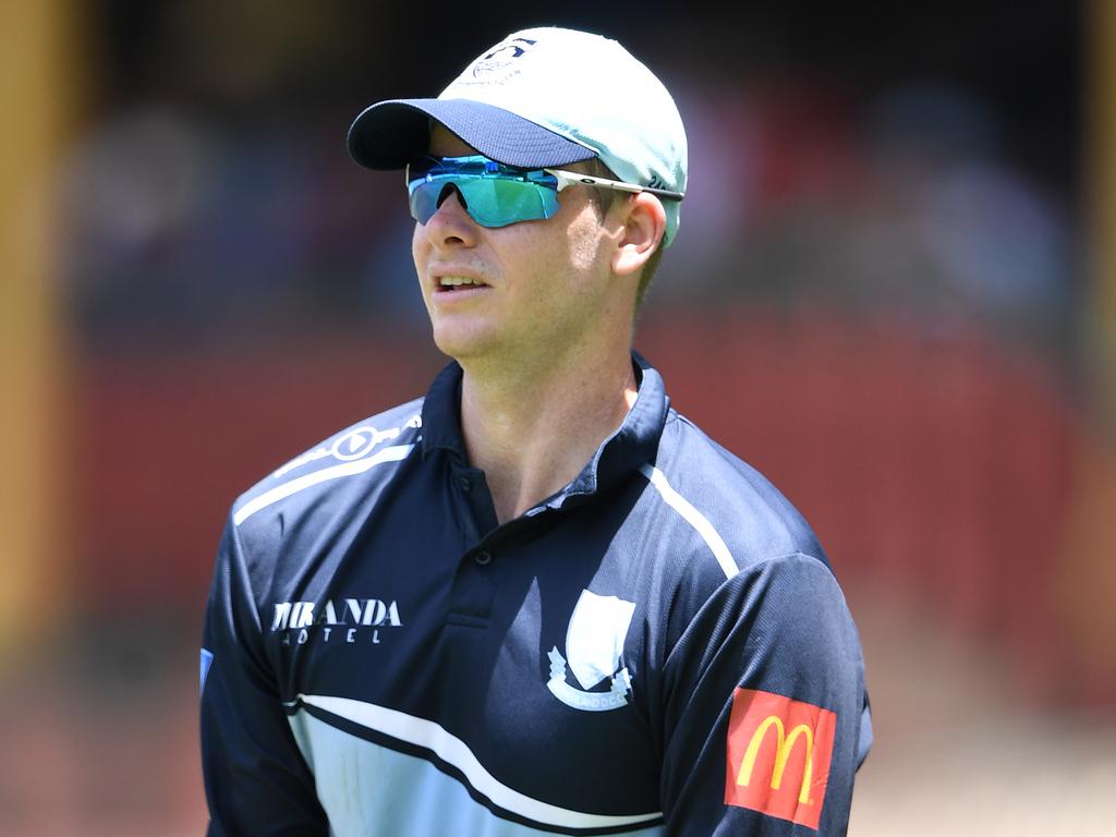 Sutherland batsman Steve Smith holds his arm while fielding against St George in the NSW T20 Cup at the SCG in Sydney, Sunday, December 16, 2018. (AAP Image/Joel Carrett) NO ARCHIVING