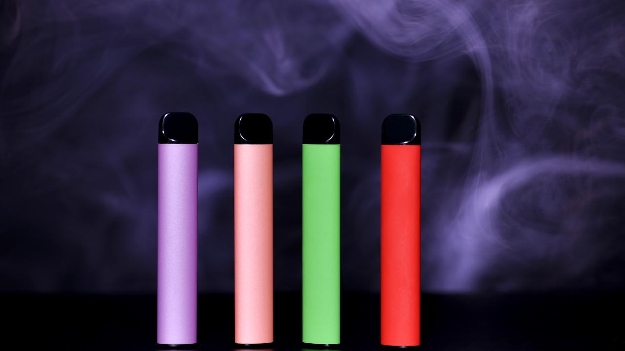 Set of colorful disposable e-cigarettes.