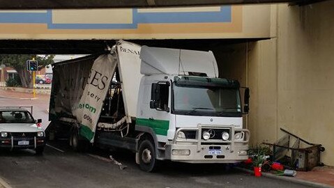 A truck stuck under Bayswater bridge. Picture: Andrew Jones