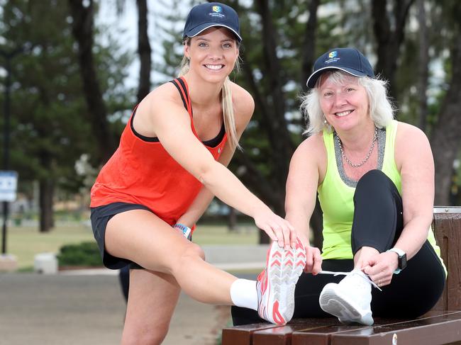 Sophie Curnow will run the 10km and full marathon this weekend - the 10km will be with her mother Wilma Curnow who has been diagnosed with early onset dementia. Photo of them at Broadbeach.Photo by Richard Gosling