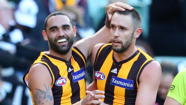 Shaun Burgoyne and Jack Gunston celebrate a goal in the win over the Magpies. Picture: Getty Images