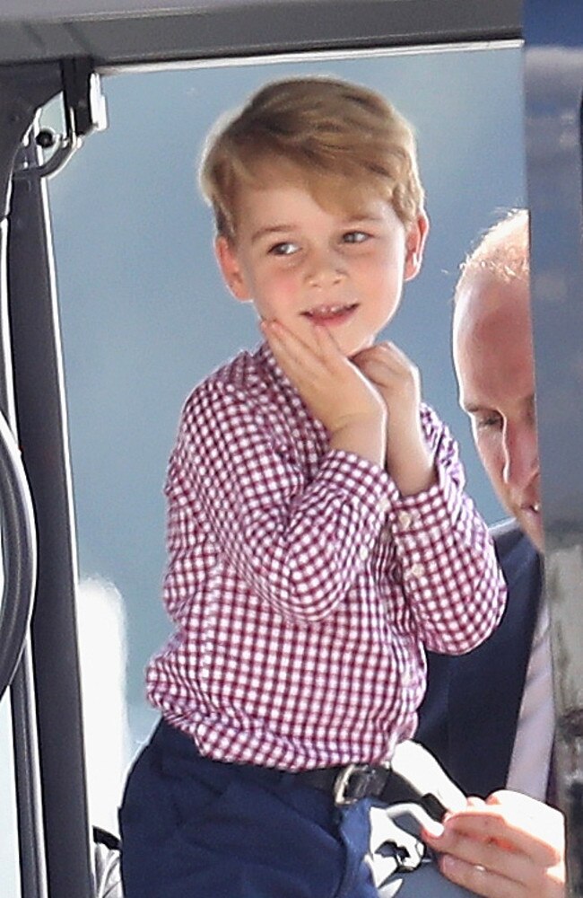 Prince William, Duke of Cambridge, with Prince George at Hamburg airport on the last day of their official visit to Poland and Germany. Picture: Getty