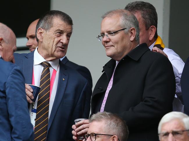 Australian Prime Minister Scott Morrison talks with former Victoria Premier and now Hawthorn President Jeff Kennett. Picture: Michael Klein.