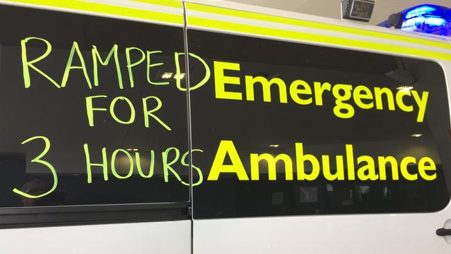 An ambulance bearing a message about ramping.