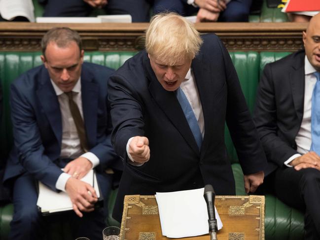 A handout photograph taken and released by the UK Parliament on July 25, 2019 shows Britain's Prime Minister Boris Johnson speaking in the Houses of Parliament in central London. (Photo by JESSICA TAYLOR / various sources / AFP) / EDITORS NOTE THE IMAGE HAS BEEN DIGITALLY ALTERED AT SOURCE TO OBSCURE VISIBLE DOCUMENTS  - RESTRICTED TO EDITORIAL USE - NO USE FOR ENTERTAINMENT, SATIRICAL, ADVERTISING PURPOSES - MANDATORY CREDIT " AFP PHOTO /JESSICA TAYLOR/ UK Parliament"