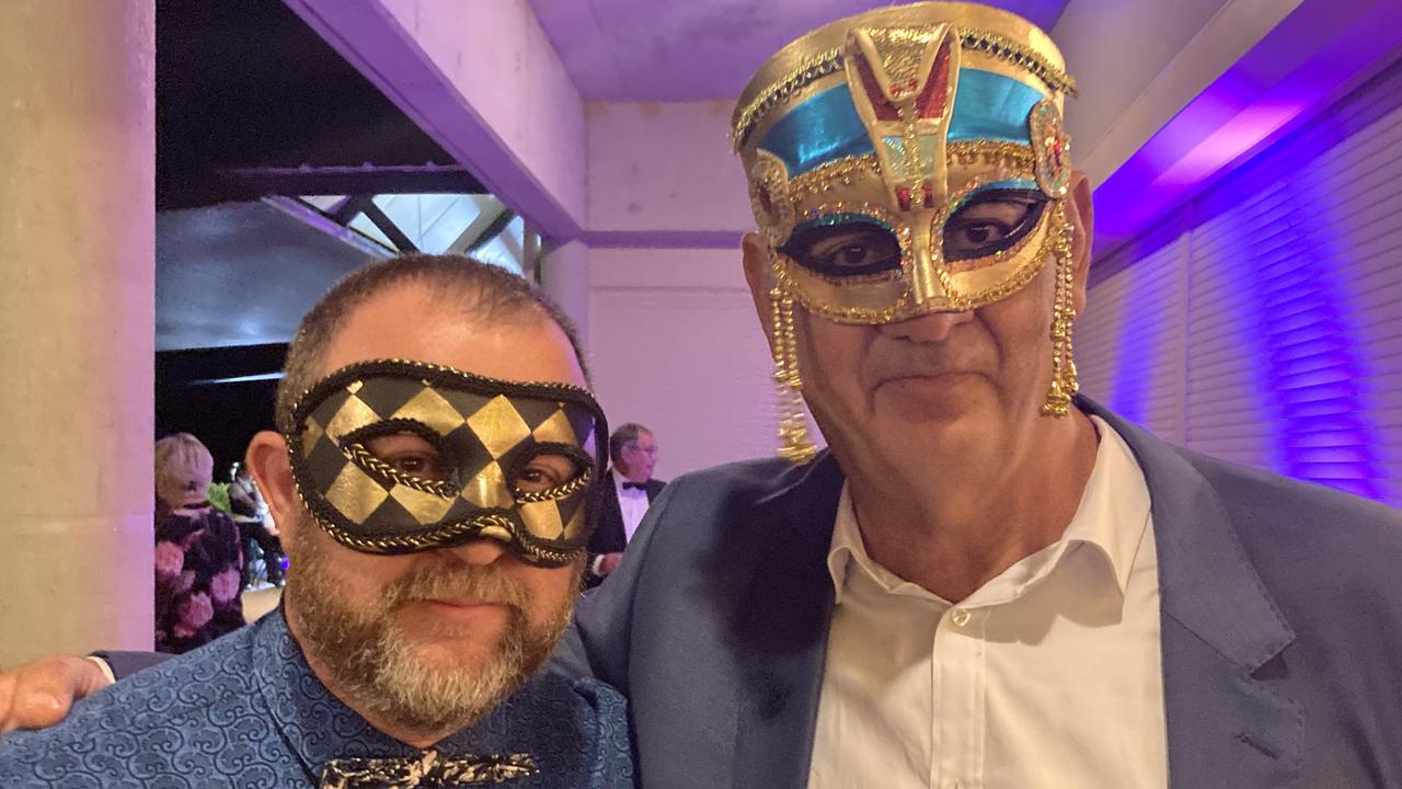 Tim Pendlebury and Marco Masciadcelli celebrate at the Gympie RSL Masked Ball, April 29 2023.