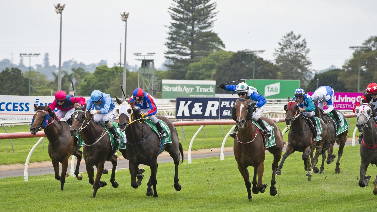 Kasita (blue sleeves) finishes strongly for Nathan Evans to win yesterday’s Three-Year-Old Class 2 Handicap at Clifford Park Picture: Kevin Farmer