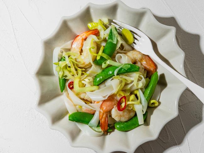 EMBARGO FOR TWAM 20 APRIL 2024. FEE MAY APPLY.Prawns and snap pea noodles and chicken noodles with sesame by Elizabeth Hewson. Photo: Nikki To