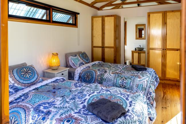The Mount Jukes Eco Resort, built from scratch by yoga aficionado David Deakin, holds glamping tents and a half-moon shaped house that face Mt Jukes and Mr Deakin says the â€œenergyâ€ of the property has to be experienced to be understood. Picture: Contributed