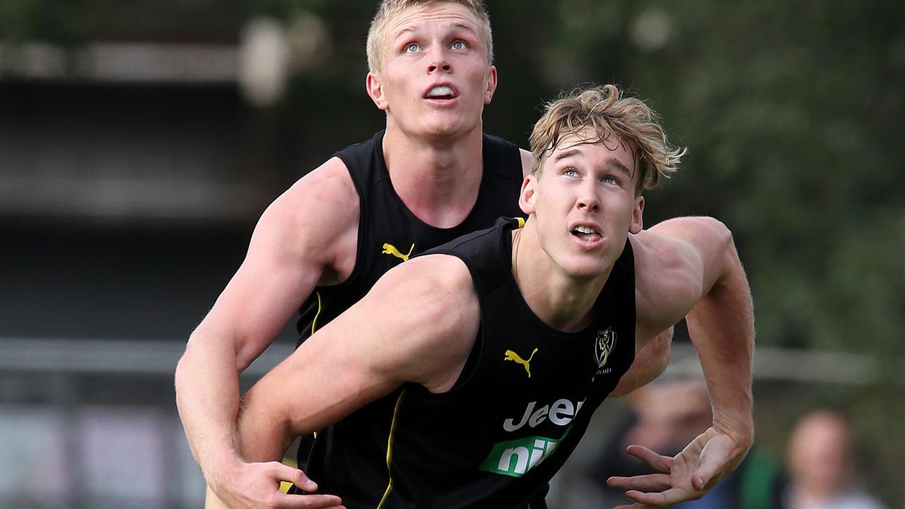 Tom Lynch battles with new teammate Ryan Garthwaite at training. Picture: Michael Klein