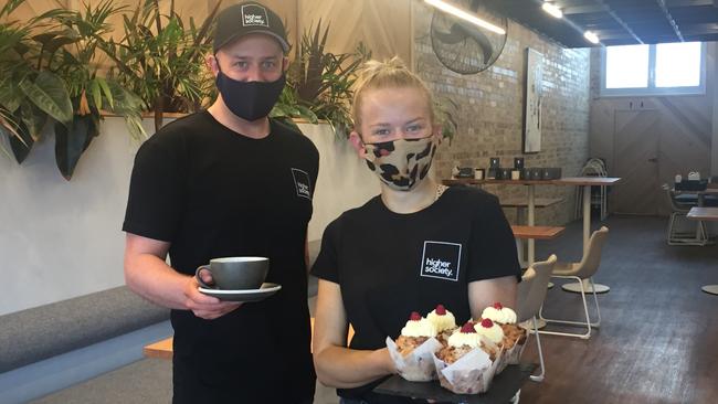 Higher Society owner Rhys Jeffrey and staffer Alex Murphy welcoming patrons in Ballarat. Picture: Tess Ikonomou.