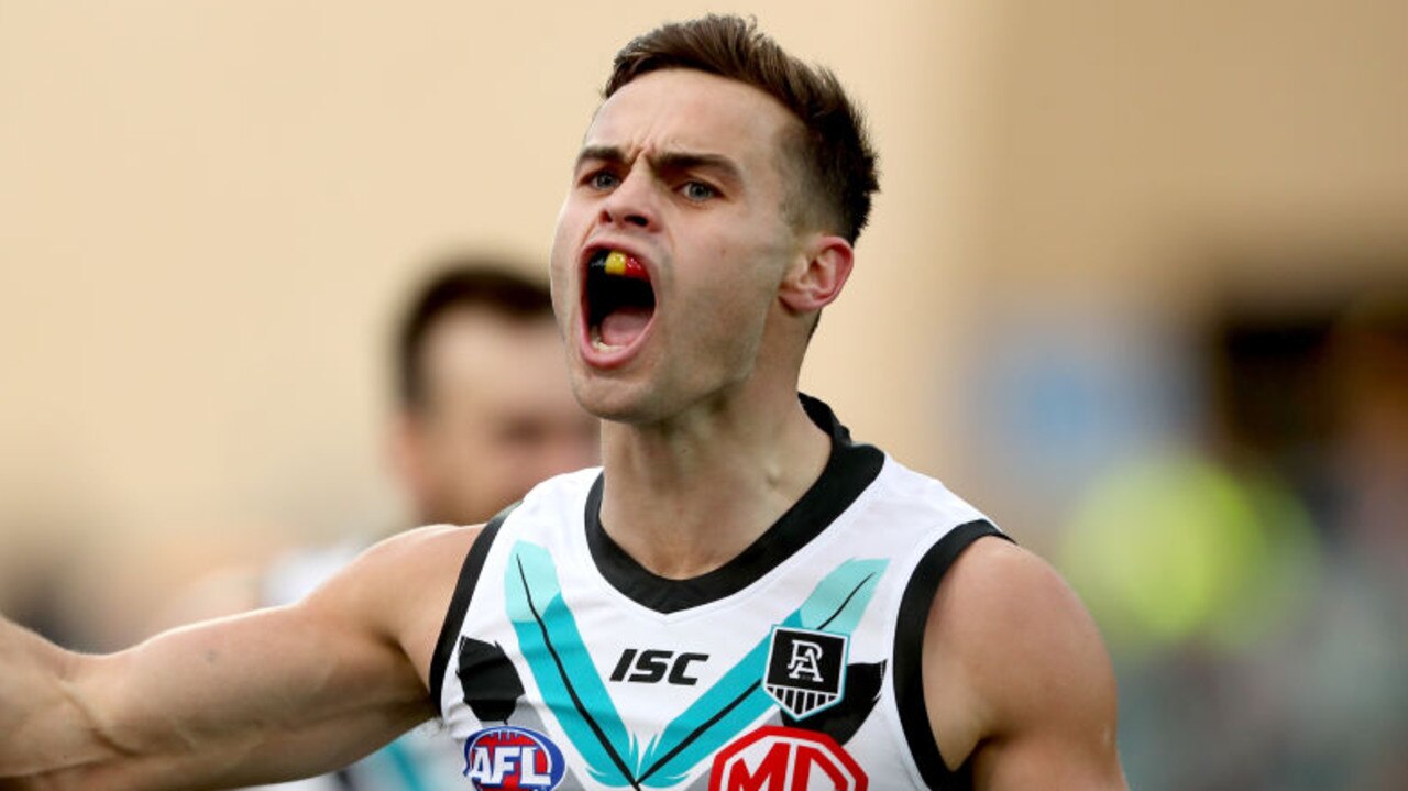 ADELAIDE, AUSTRALIA - AUGUST 22: Karl Amon of the Power celebrates a goal during the 2020 AFL Round 13 match between the Port Adelaide Power and the Hawthorn Hawks at Adelaide Oval on August 22, 2020 in Adelaide, Australia. (Photo by James Elsby/AFL Photos via Getty Images)