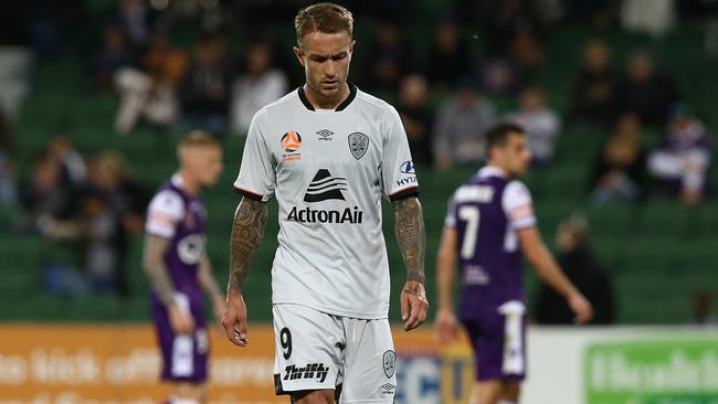 Adam Taggart of the Roar walks from the field at half-time during the round three A-League match between the Perth Glory and the Brisbane Roar. Glory won 2-1. Picture: Paul Kane/Getty Images