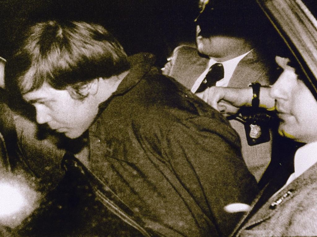 John Hinckley Jnr being arrested after shooting Ronald Reagan.