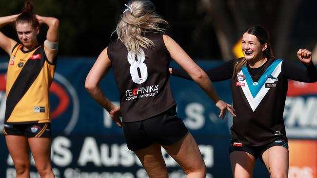 Georgia Kitchell and Molly Kissane celebrate on the final siren. Picture: Hamish Blair