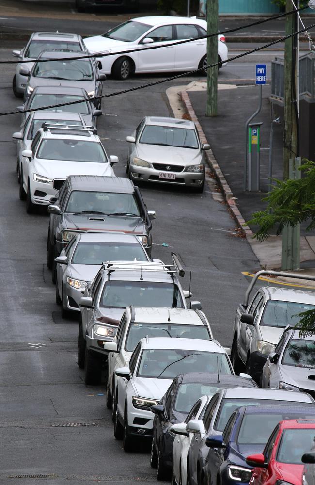 Covid testing queues on the first full day of Brisbane’s three-day lockdown after a cleaner tested positive to the UK Covid-19 strain. Picture: David Clark