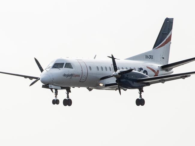 SYDNEY, AUSTRALIA - NewsWire Photos May 6, 2021: A Rex (Regional Express) aircraft landing at Sydney Airport.Picture: NCA NewsWire / James Gourley