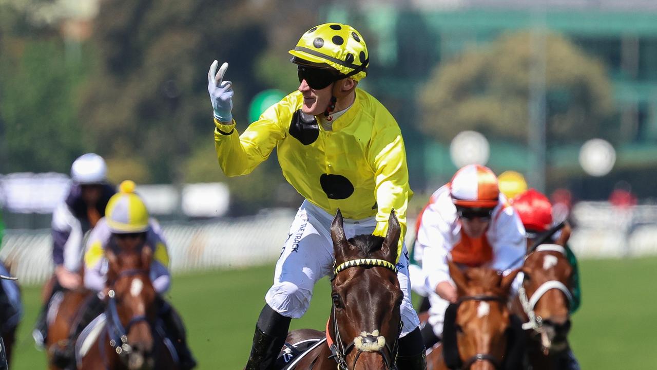 MELBOURNE, AUSTRALIA – NOVEMBER 07: Jockey Mark Zahra riding Without A Fight reacts after winning the Lexus Melbourne Cup during Melbourne Cup Day at Flemington Racecourse on November 07, 2023 in Melbourne, Australia. (Photo by Asanka Ratnayake/Getty Images)