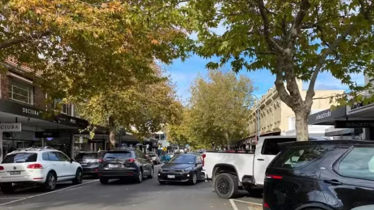 A so-called Yank tank seen parked out onto the road because it's too big for a spot.