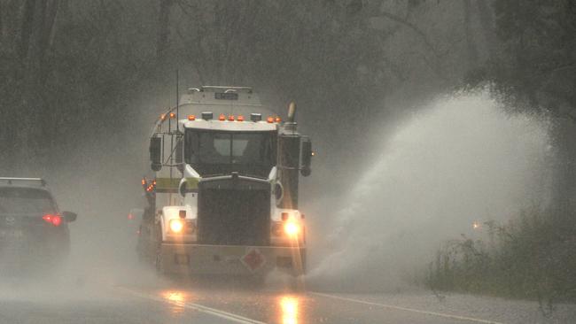 Vehicles on the flooded Wakehurst Parkway. Picture: News Corp