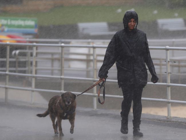 Rain buckets down on Bondi Beach on Monday. Picture: John Grainger.