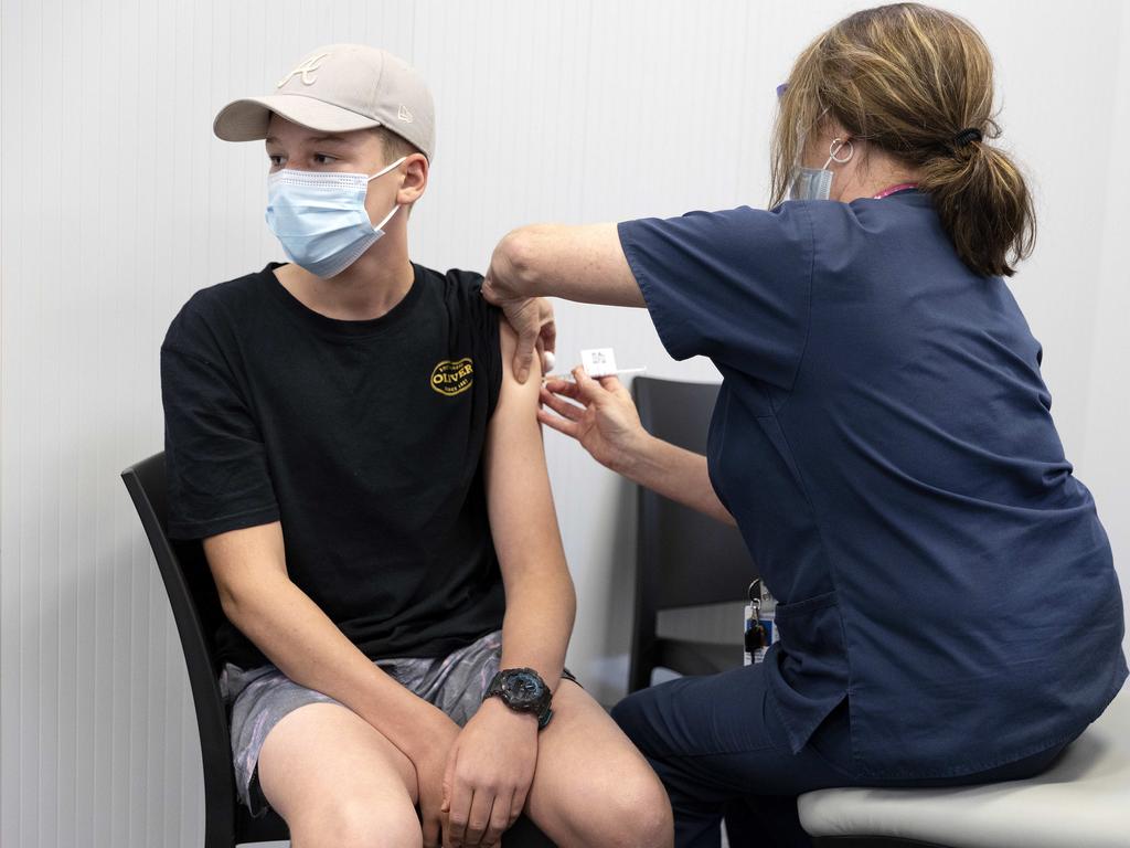 Arley Kluck 14 gets his second Pfizer vaccination at the Ipswich vaccination hub. NCA NewsWire / Sarah Marshall