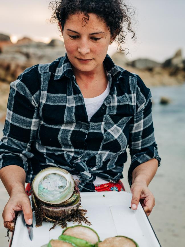 Tasmanian chef and author Analiese Gregory with some fresh, greenlip abalone caught on Flinders Island. Picture: ADAM GIBSON