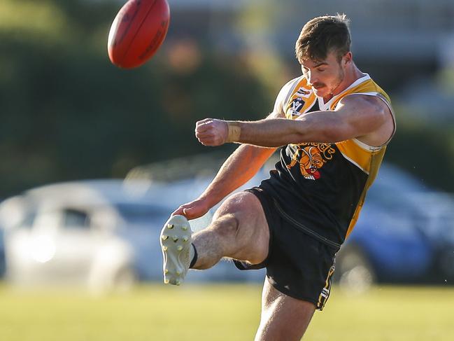 Brenton Lambert takes a kick for YCW. Picture: Valeriu Campan