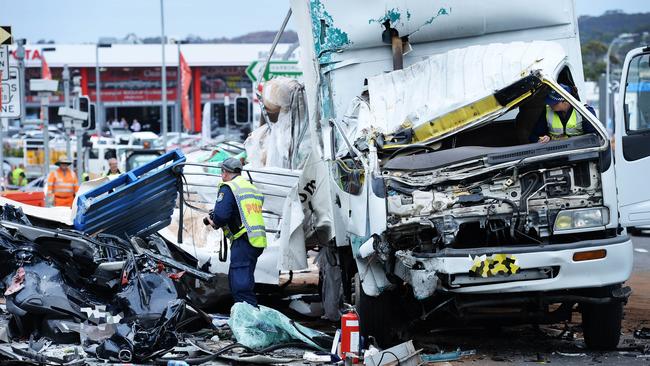 Police at the scene of a motor vehicle accident where a truck crashed into traffic stopped at the corner of Warringah and Pittwater roads, Dee Why. Lobbying efforts are underway to have this intersection upgraded to make it safer and congestion-free. Picture: Braden Fastier