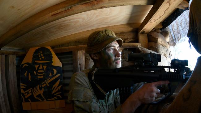 Exercise Brolga Run at the Townsville Field Training Area at High Range. Soldiers from 3CER build a Brigade Command Post bunker. Sapper Kye Lindley. Picture: Evan Morgan