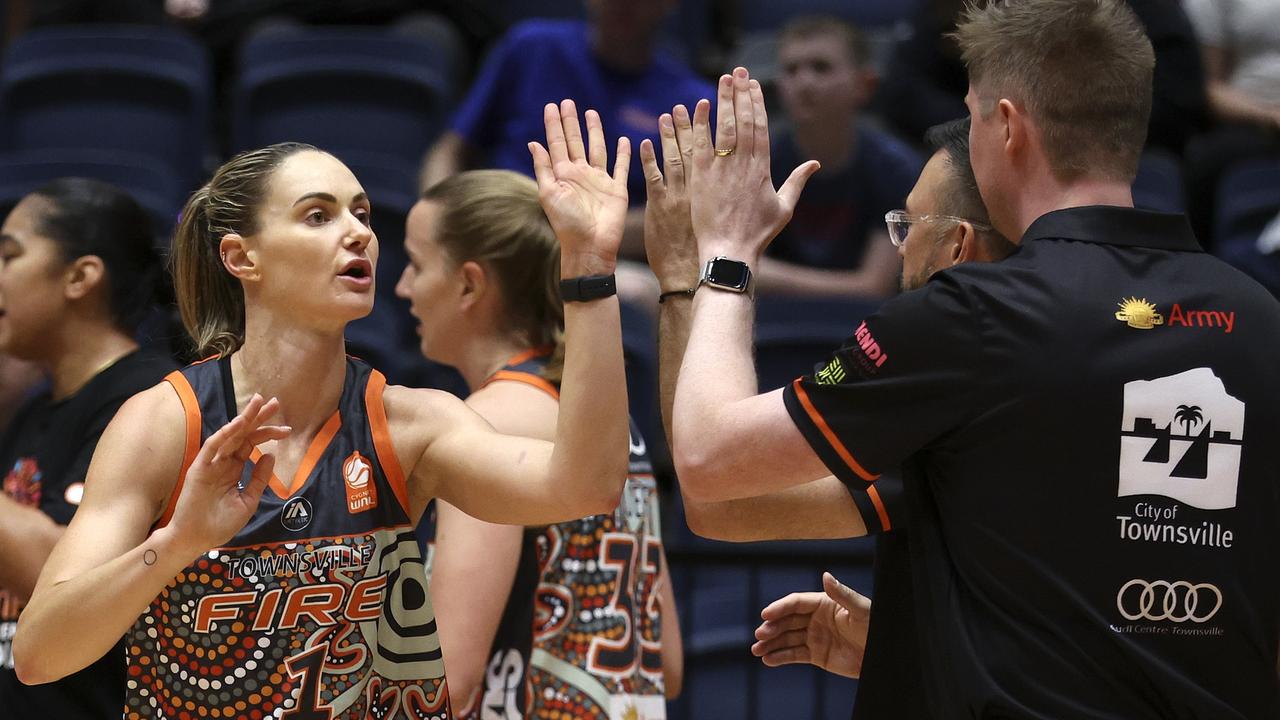 Alice Kunek high fives coach Seebohm. (Photo by Martin Keep/Getty Images)