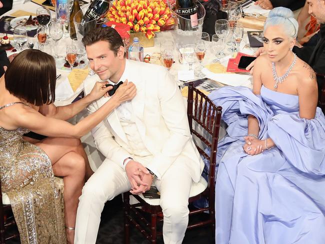 MUST CREDIT GETTY/NBCONE TIME USE - FEE APPLIES BEVERLY HILLS, CA - JANUARY 06:  76th ANNUAL GOLDEN GLOBE AWARDS -- Pictured: (l-r) Irina Shayk, Bradley Cooper and Lady Gaga at the 76th Annual Golden Globe Awards held at the Beverly Hilton Hotel on January 6, 2019. --  (Photo by Richard Heathcote/NBC/NBCU Photo Bank)