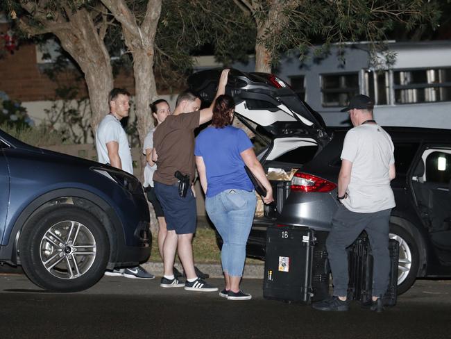 Detectives and police pack evidence into a waiting detectives vehicle after it was part of a police operation earlier in the day  at 142 St Georgeâ€™s Road Bexley  Picture : Steve Tyson