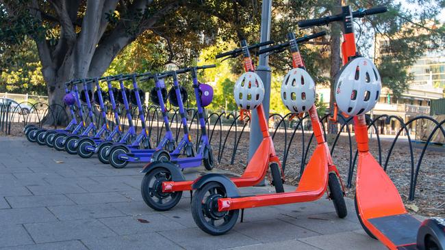 Beam and Neuron e-scooters parked in the CBD.