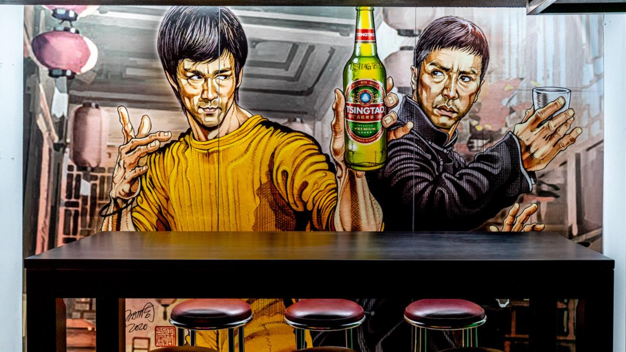 Ni Hao Bar transports you back into time with retro flashing neon lights and murals of Bruce Lee and his master, IP Man, which was designed and painted by Adam Chow.