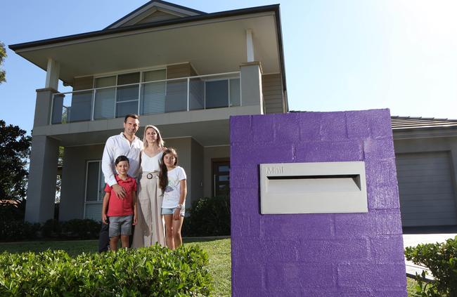 The Leys family is encouraging other homes to take part in the initiative and #letspaintthetownpurple. Picture: Robert Pozo.