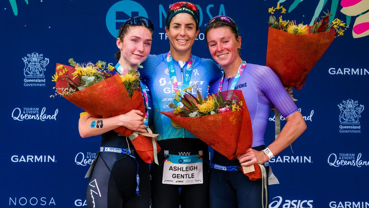 Noosa triathlon winner Ashleigh Gentle (centre) on the podium with Richelle Hill (left, second) and Natalie van Coevorden (right, third). Photo: Alex Polizzi